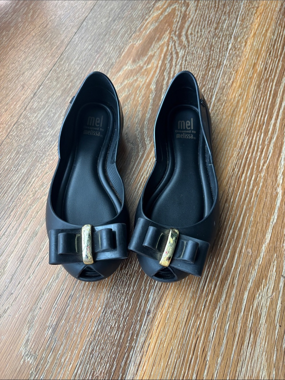 Mel by Melissa Black Peep-Toe Flats with Bow and Gold Accent